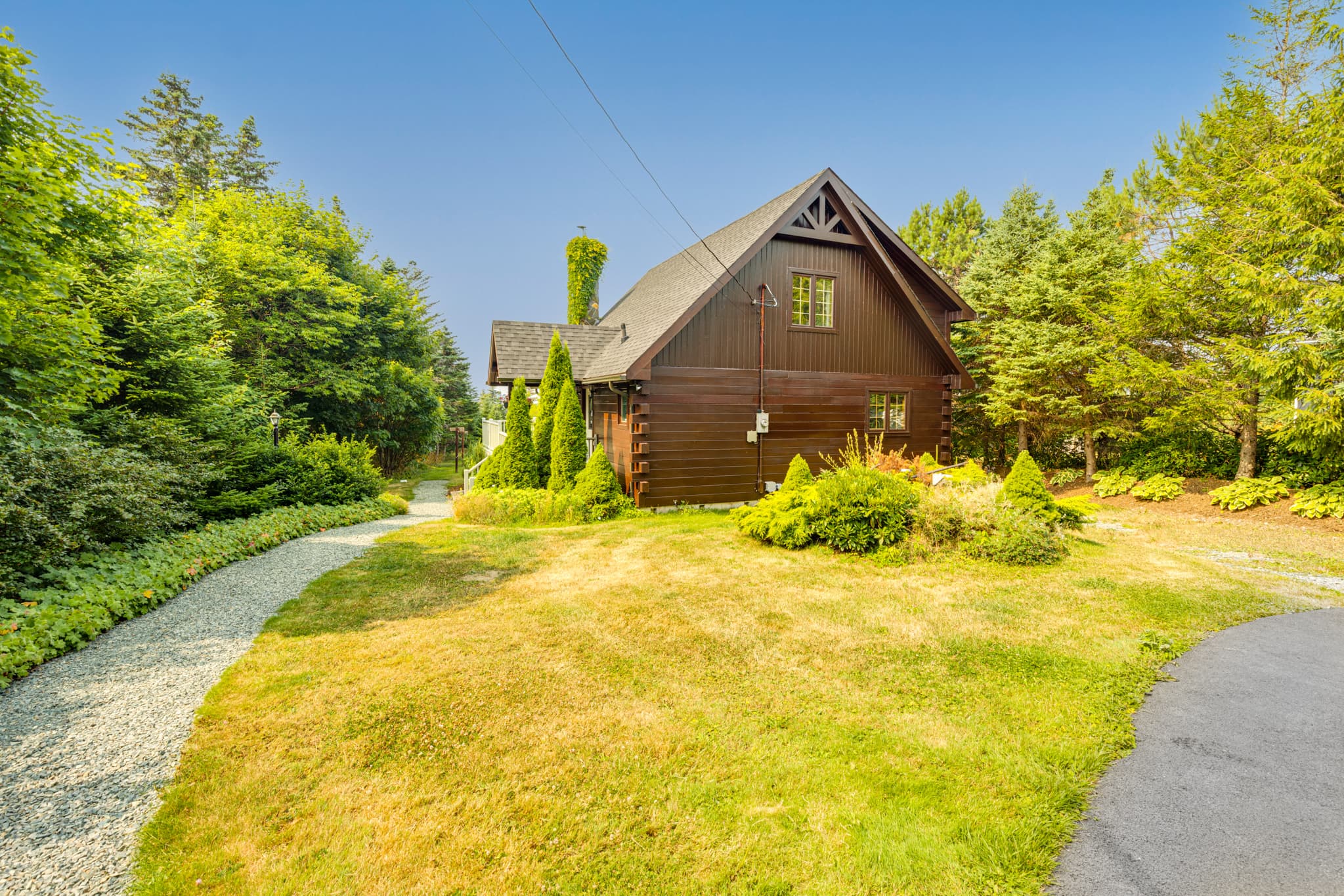 Exterior side view with log detailing